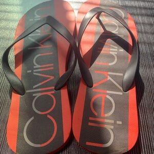 Calvin Klein Red and Black Flip-Flops